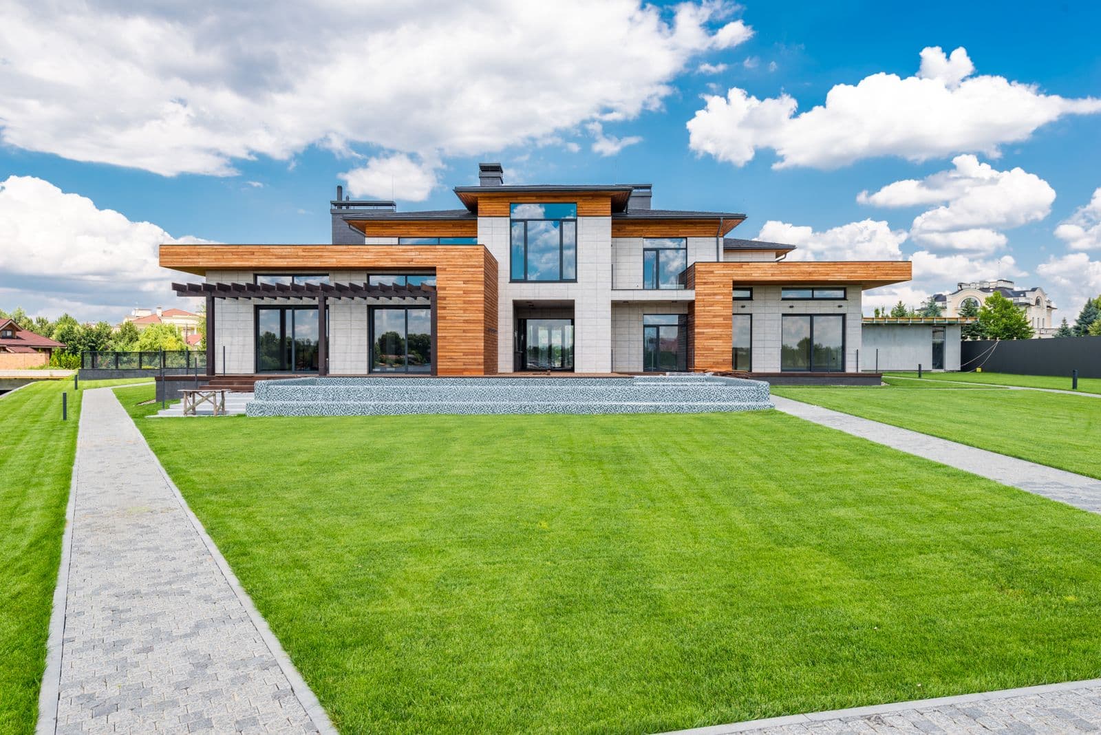 Exterior of a modern house with large glass windows