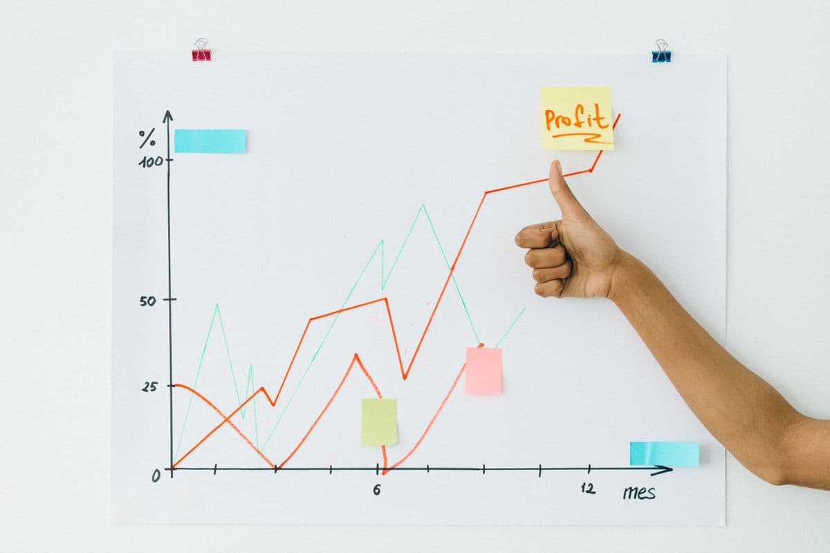 An upward business growth chart displayed on a screen